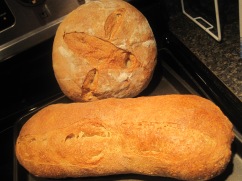 aaaand the end products! look at these beauties! The scoring on boule made an impression of a face, do you not think? :)